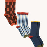Three pairs of organic and Fairtrade cotton socks by Little Green Radicals - brown teddy bears, blue and white gingham and navy colour block - available to buy now at Babipur.