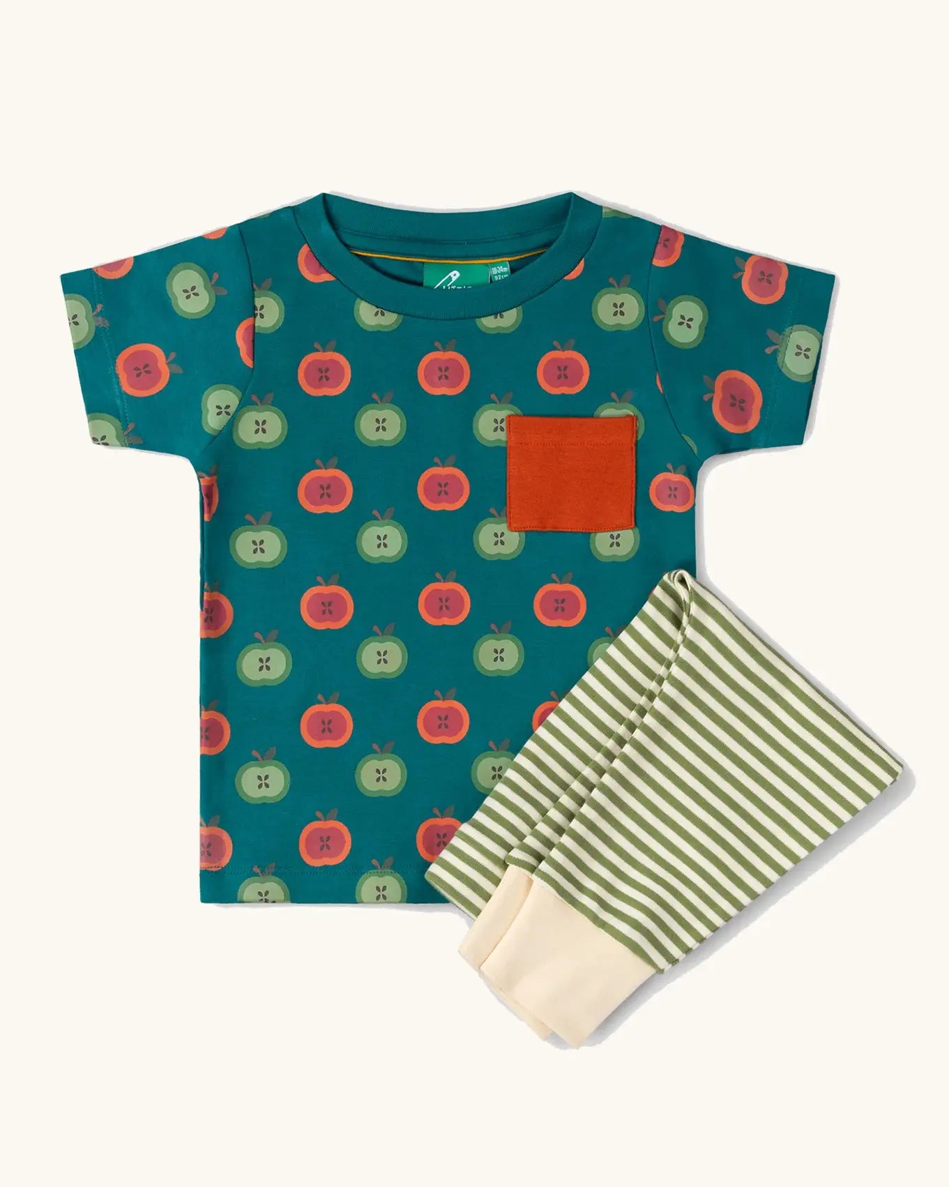 Little Green Radicals apple picking organic cotton playset outfit. A short sleeved t-shirt with red and green repeat apple print on a green background with green and cream striped joggers. 