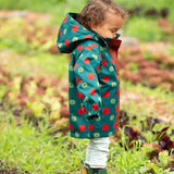 Side of a child wearing Little Green Radicals apple picking recycled waterproof children's raincoat.  