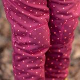 Close up of the knee patches on the Little Green Radicals autumn polkadot cosy cotton knee patch joggers.