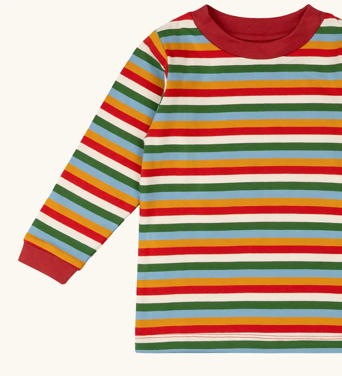 Close up of the Little Green Radicals Autumn rainbow stripe organic cotton long sleeve top.