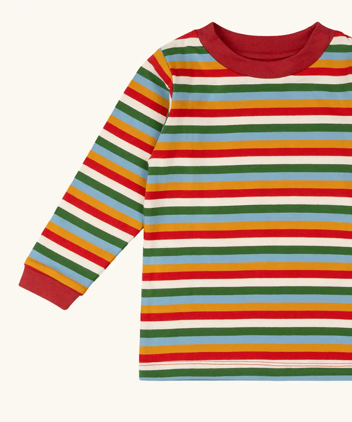 Close up of the Little Green Radicals Autumn rainbow stripe organic cotton long sleeve top.