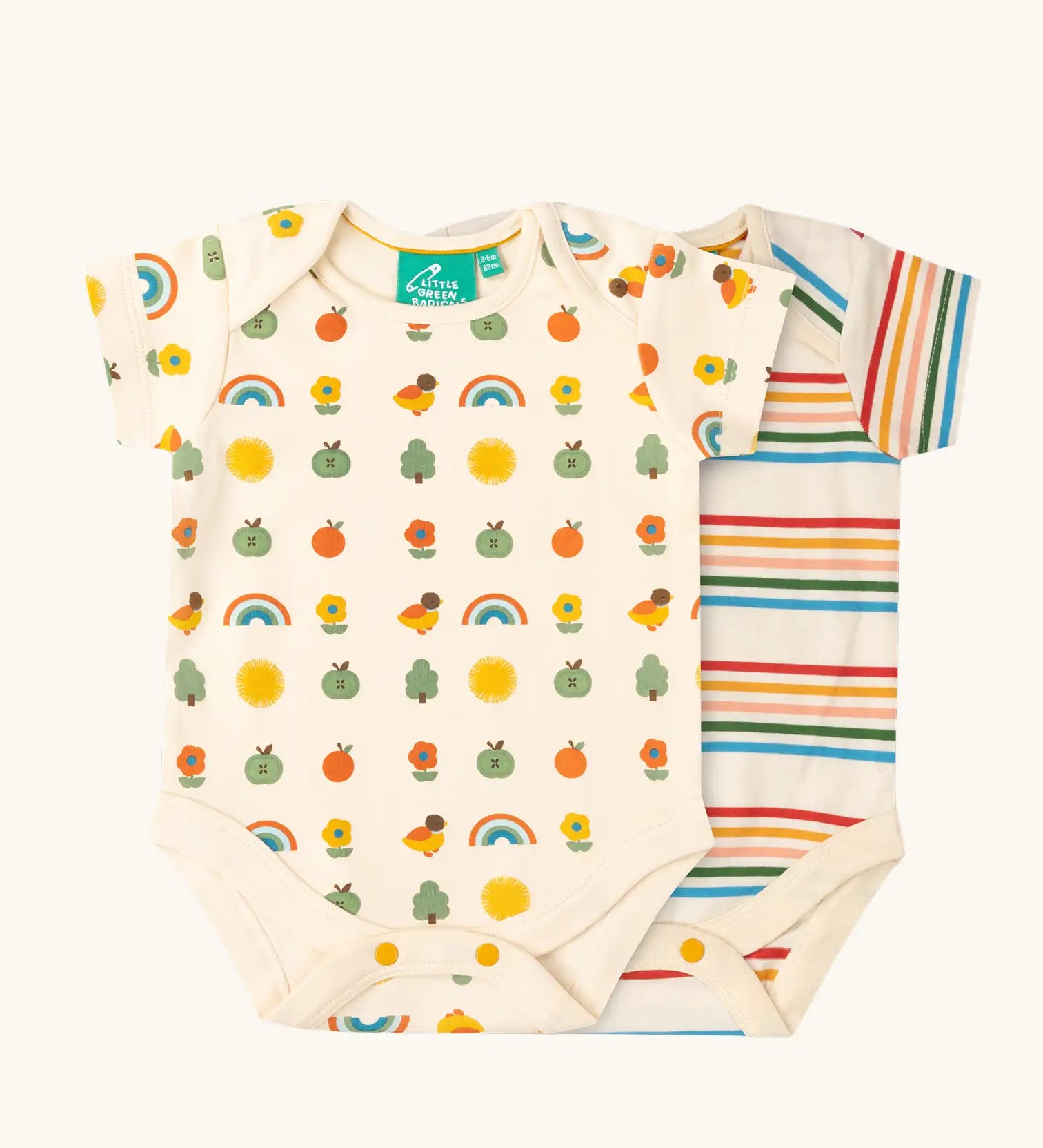 Little Green Radicals vintage style cream rainbows organic cotton short sleeved baby bodysuit 2 Pack. One vest with a repeat nature themed print and one with a cream rainbow striped design. 