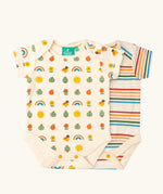 Little Green Radicals vintage style cream rainbows organic cotton short sleeved baby bodysuit 2 Pack. One vest with a repeat nature themed print and one with a cream rainbow striped design. 