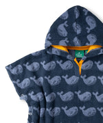 Close up of the poppered side and yellow lined hood on the Little Green Radicals organic cotton Singing Whales Baby Towel Poncho.