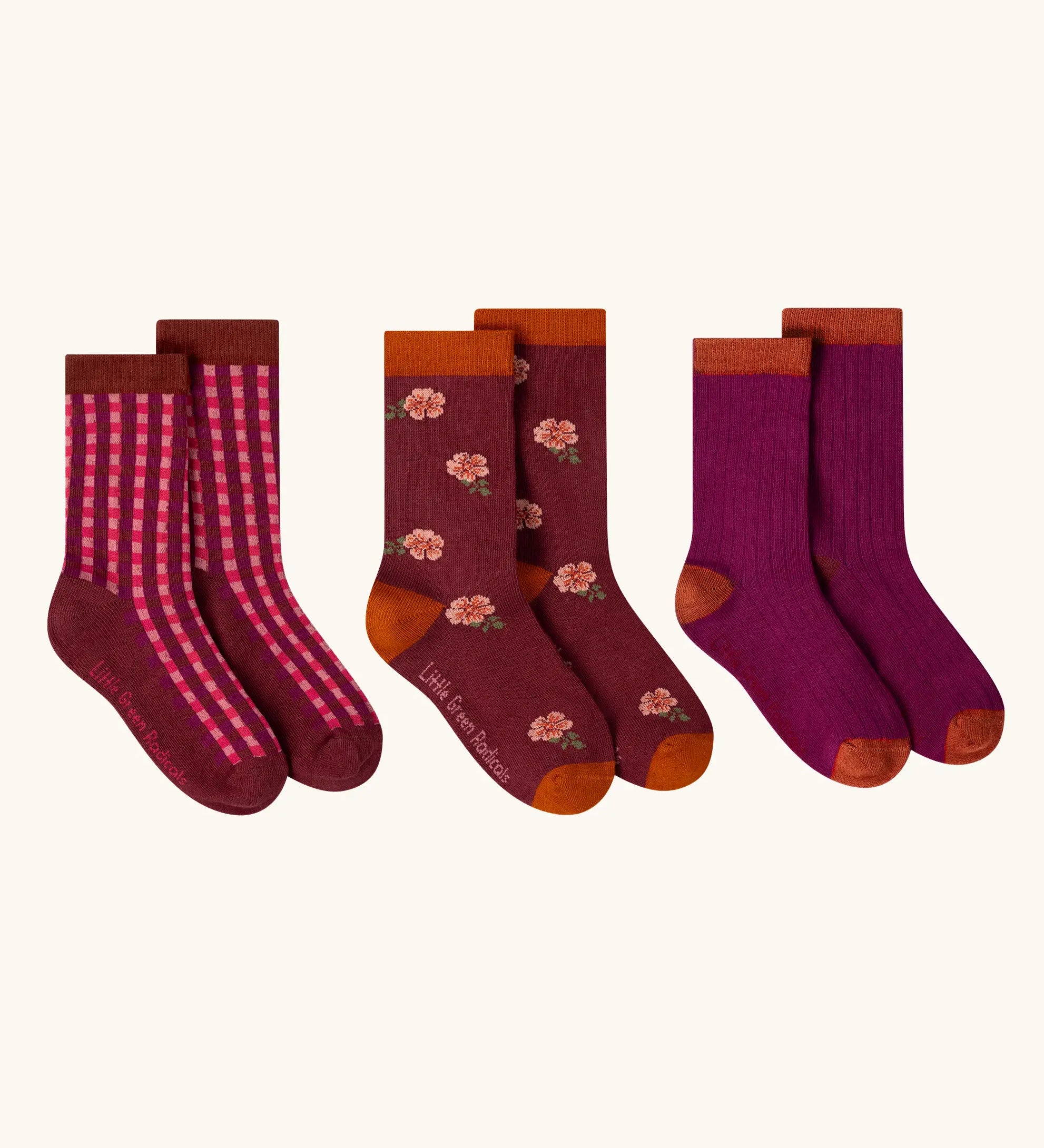 Little Green Radicals berry petals organic cotton socks 3 pack. One gingham. one floral one colour block pair. 