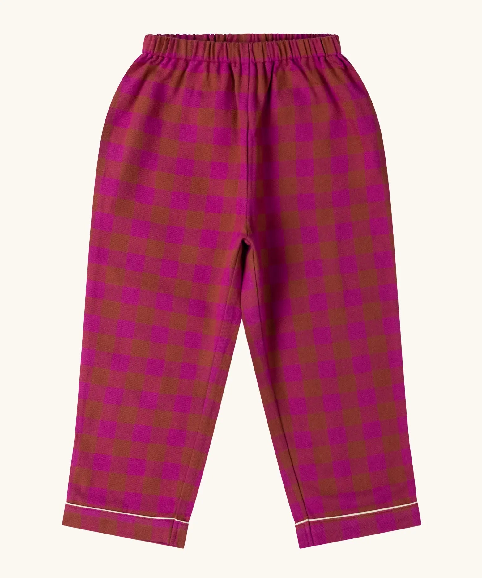Trousers from the Little Green Radicals Kids berry pink check organic cotton classic pyjamas. Button up long sleeve top and matching trousers. 