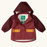 Little Green Radicals berry purple recycled waterproof fleece lined winter coat with the zip half open.