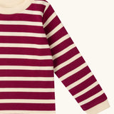 Close up of the Little Green Radicals berry purple striped long sleeve organic cotton kids top.