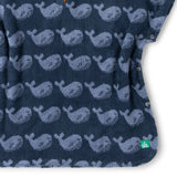 Close up of the material of the Little Green Radicals organic cotton Singing Whales Baby Towel Poncho.