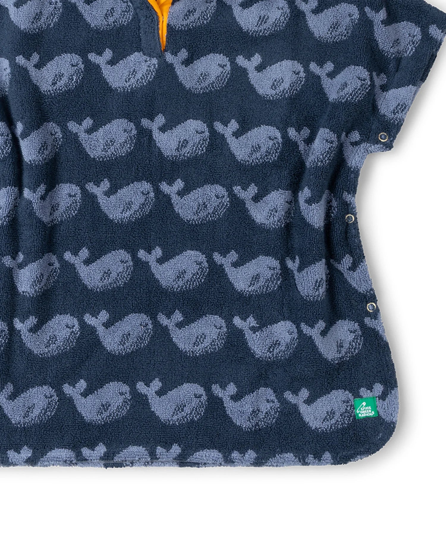 Close up of the material of the Little Green Radicals organic cotton Singing Whales Baby Towel Poncho.