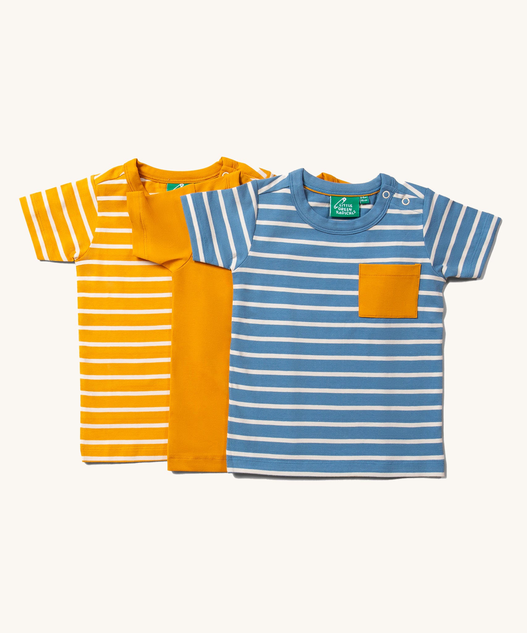 Little Green Radicals Organic T-Shirt Set, 3 kids t-shirts made form Fairtrade organic cotton with a contrasting patch pocket. One has blue and white stripes, one plain yellow and one yellow and white stripes.