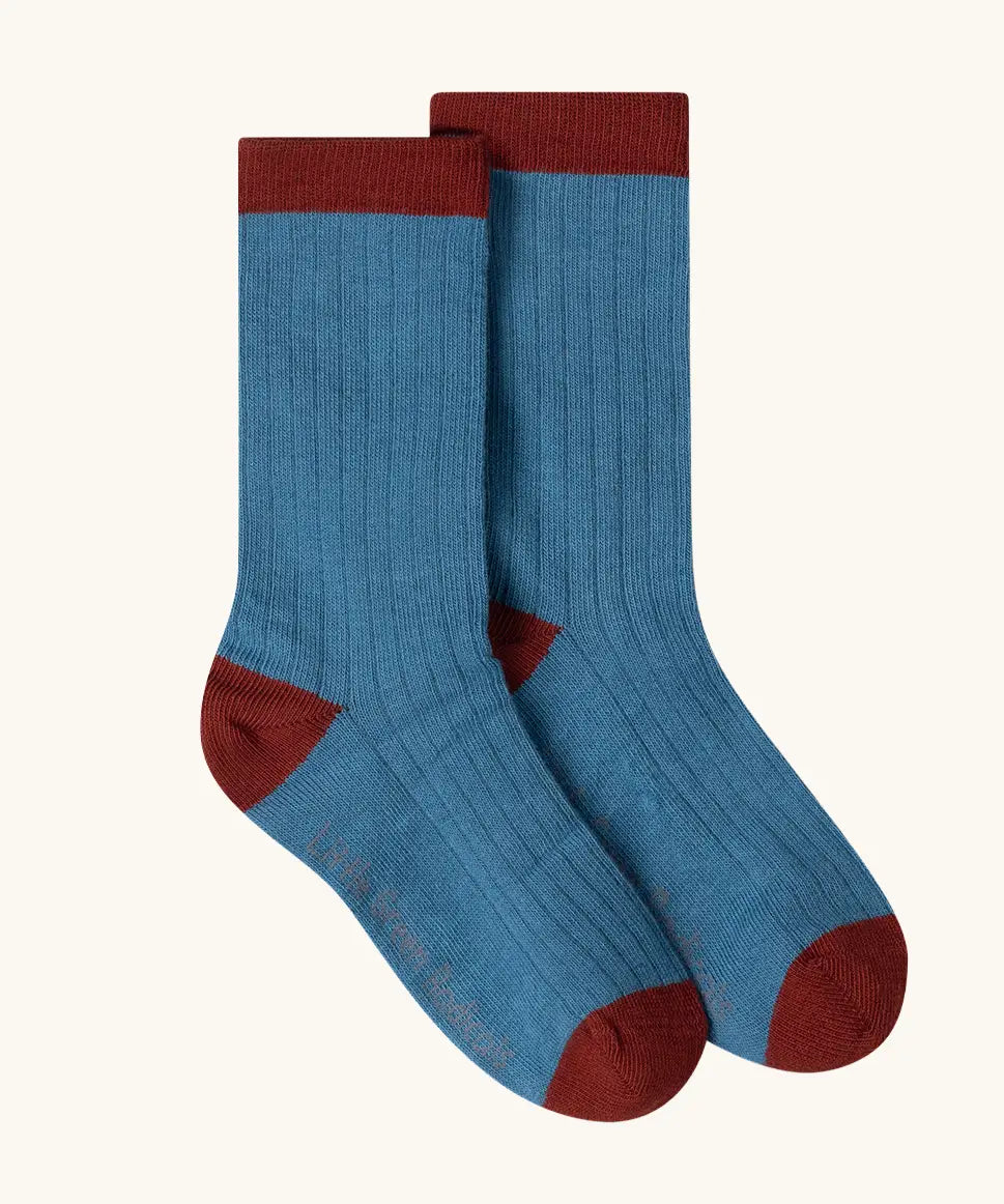 Blue socks from the Little Green Radicals blue penguins organic cotton socks 3 pack. 