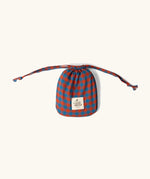 Storage bag from the Little Green Radicals burnt ochre check adult organic cotton classic pyjamas.