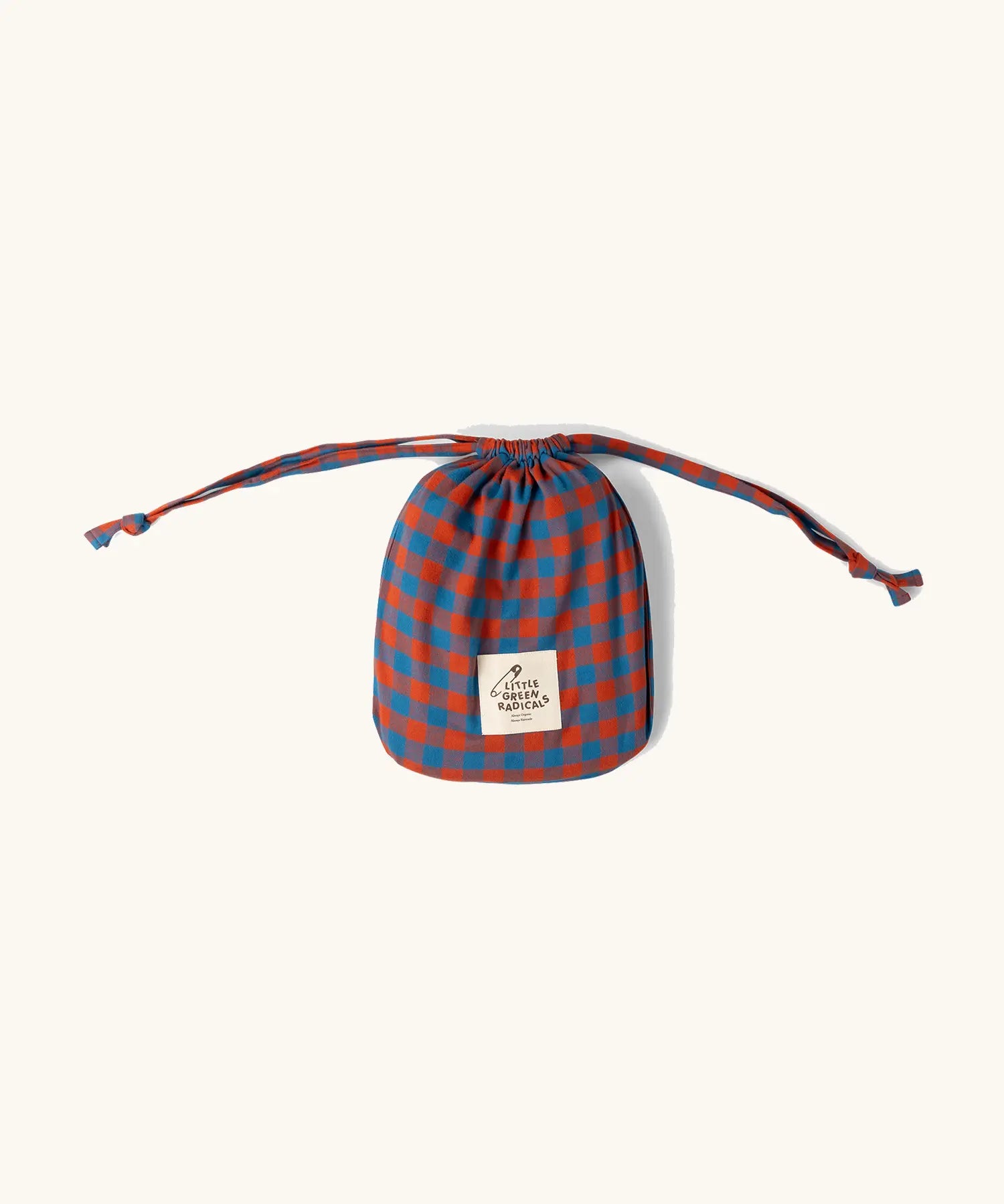 Storage bag from the Little Green Radicals burnt ochre check adult organic cotton classic pyjamas.