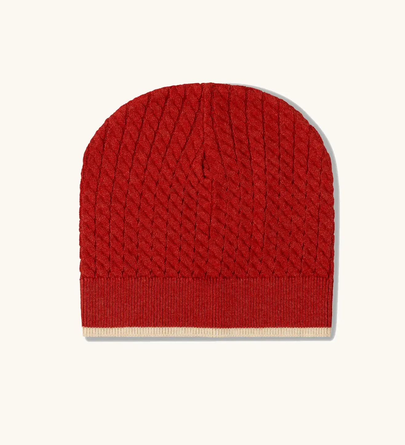 Little Green Radicals burnt ochre red organic cotton knitted beanie hat.