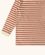 Close up of the Little Green Radicals burnt ochre stripe organic cotton long sleeve organic cotton children's top.