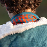 Close up of the lined hood on the Little Green Radicals calm sea colourblock organic cotton sherpa lined toasty coat .