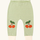 Little Green Radicals cherry knee patch green cream striped organic cotton joggers.