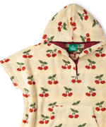 Close up of the red lined hood on the Little Green Radicals little cherries cream organic cotton kids hooded towel poncho.The poncho has a popper closure on the neck and a kangaroo pocket on the front. 