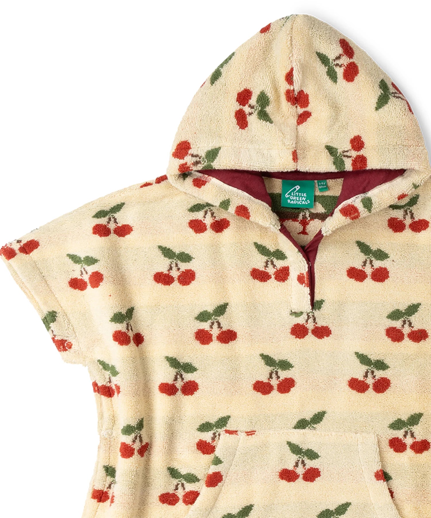 Close up of the red lined hood on the Little Green Radicals little cherries cream organic cotton kids hooded towel poncho.The poncho has a popper closure on the neck and a kangaroo pocket on the front. 