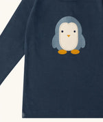 Close up of the Little Green Radicals blue penguins applique long sleeve organic cotton top in navy.