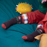 A close up of the retro style flower print socks from the Little Green Radicals Kids Ankle Socks 3 Pack. These organic cotton children's socks are  part of a wide range of organic cotton clothing for children available here at Babipur. 