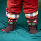 A close up of the retro style flower print socks from the Little Green Radicals Kids Ankle Socks 3 Pack. These organic cotton children's socks are  part of a wide range of organic cotton clothing for children available here at Babipur. 