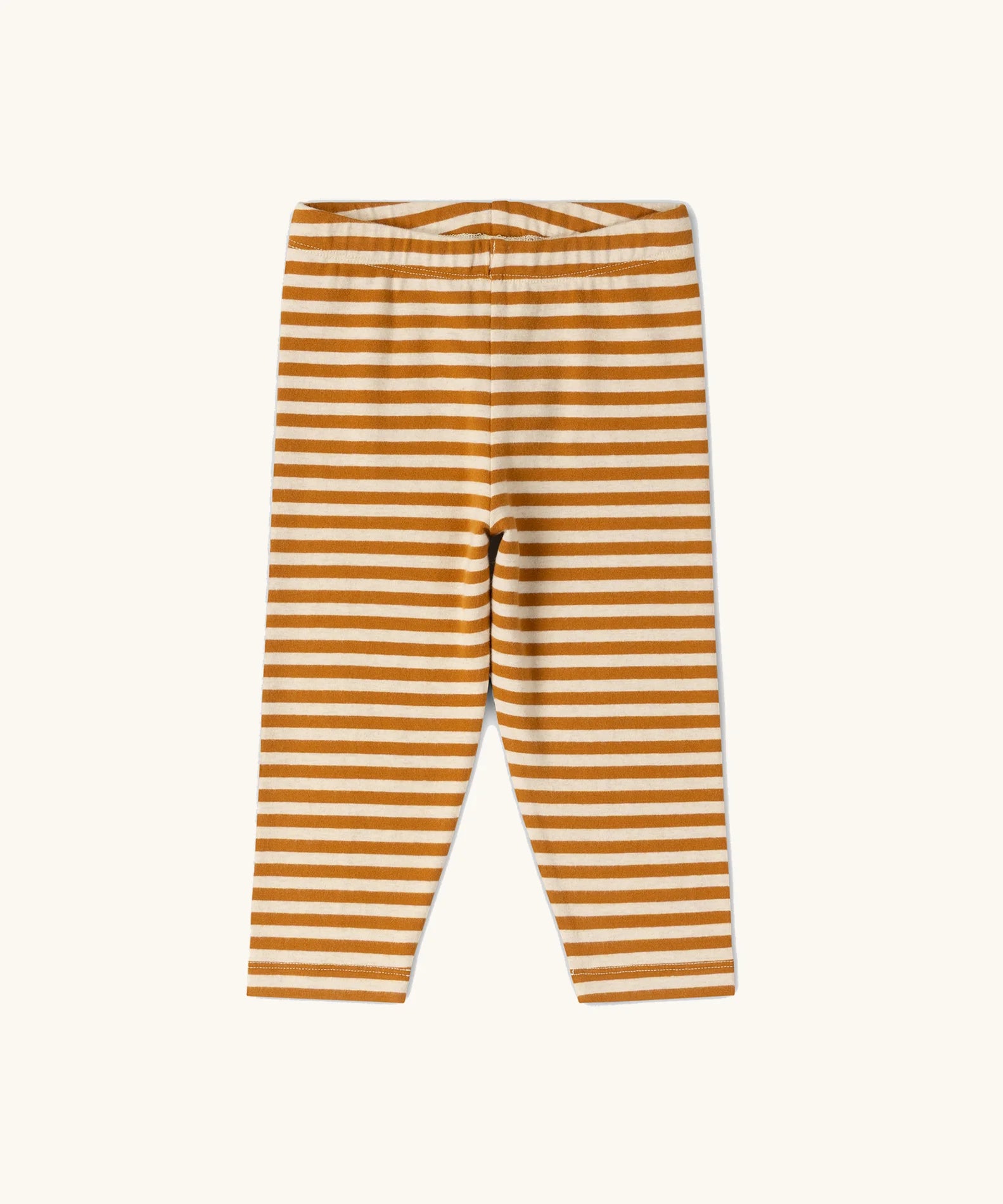 Little Green Radicals children's apricot gold striped organic cotton leggings.