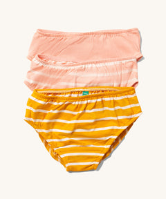 Little Green Radicals Kids Organic Cotton Briefs Set in a 3 Pack. One pair is striped yellow gold, one is pink striped and one is plain pink.