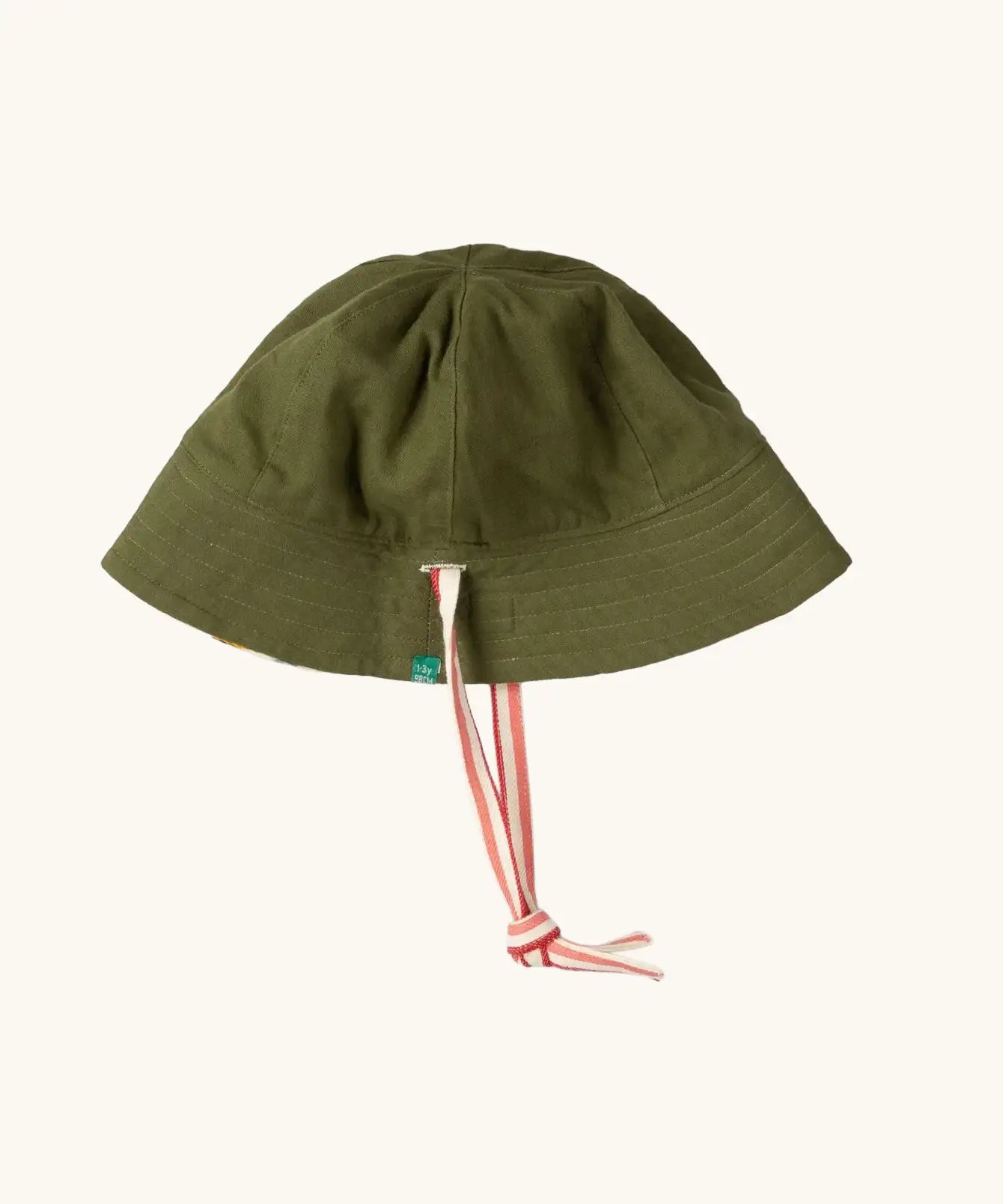 Little Green Radicals reversible organic cotton kids sunhat shown on the green side. 