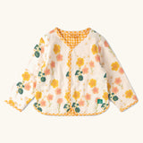 Little Green Radicals children's Flora Reversible Spring Jacket in cream. Yellow and pink repeat flower print on a cream background.