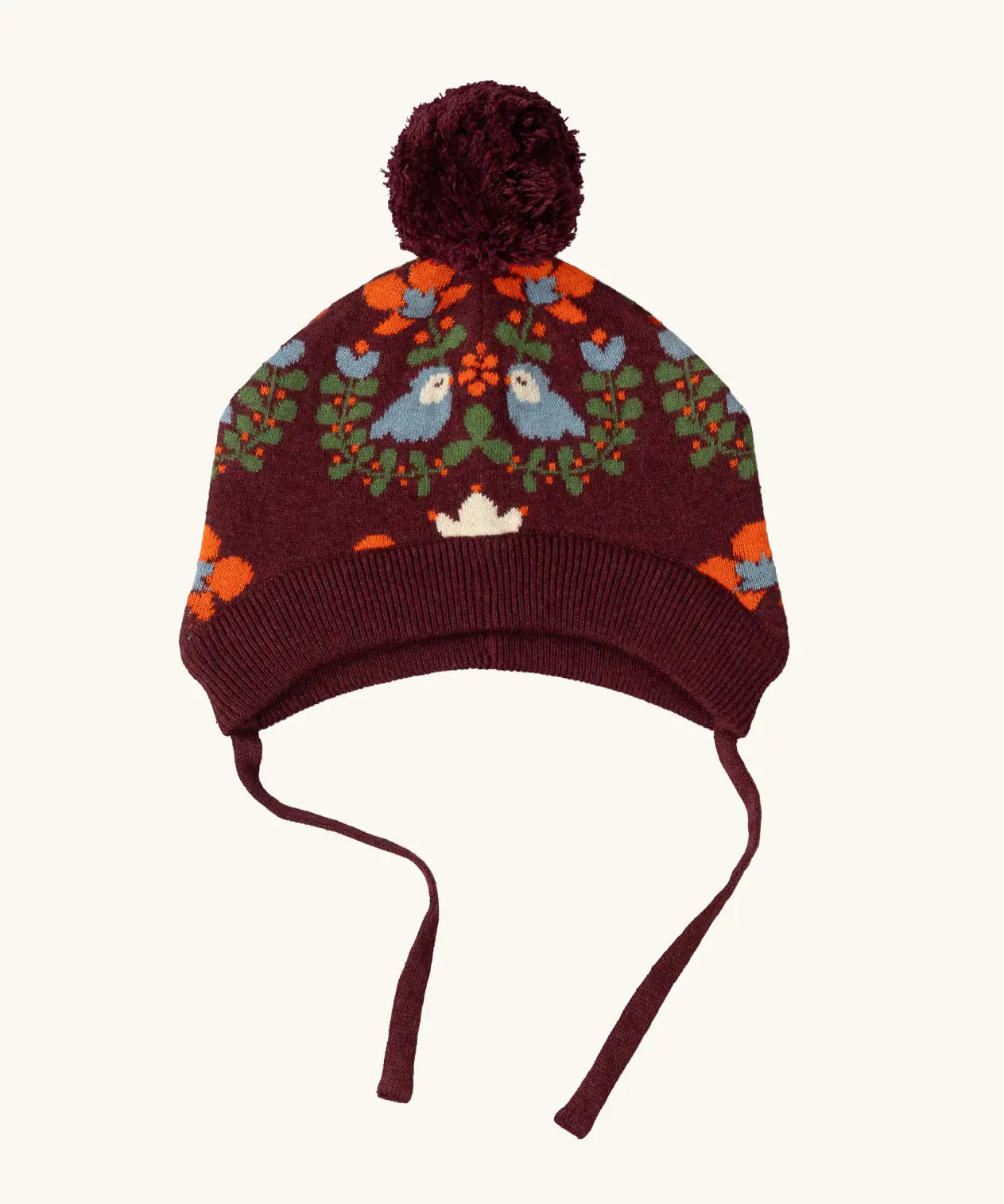 Little Green Radicals folk birds knitted purple bobble hat with chin tie straps.