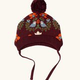 Little Green Radicals folk birds knitted purple bobble hat with chin tie straps.