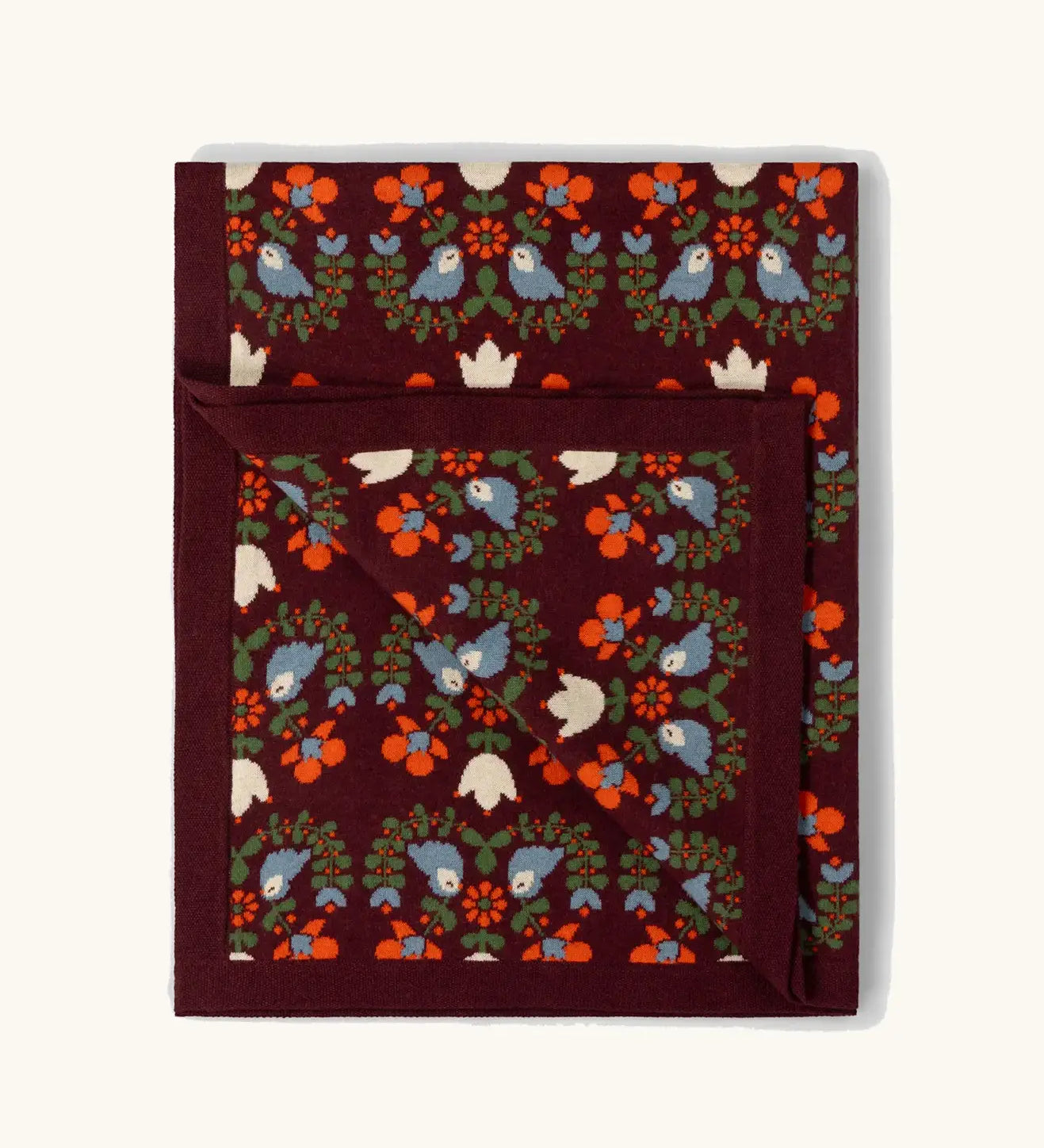 Little Green Radicals purple folk birds knitted organic cotton baby blanket. 