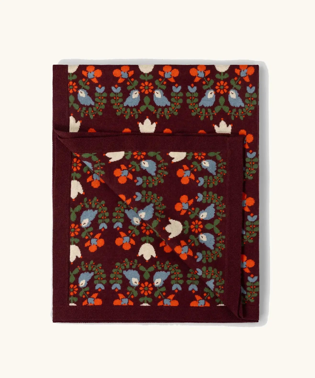 Little Green Radicals purple folk birds knitted organic cotton baby blanket. 