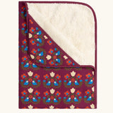Little Green Radicals folk bird organic cotton hooded baby blanket with sherpa fleece lining.