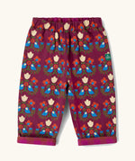 Little Green Radicals folk birds organic cotton reversible pull on trousers. Deep pink background with a repeat bird and flower print.