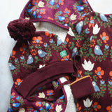 Little Green Radiclas Folk Birds print purple hooded blanket knitted hat and knitted jumper. 