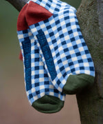 Little Green Radicals blue and white gingham style organic cotton children's socks. These socks are a part of a wide range of organic cotton clothing and accessories for children available here at Babipur. 
