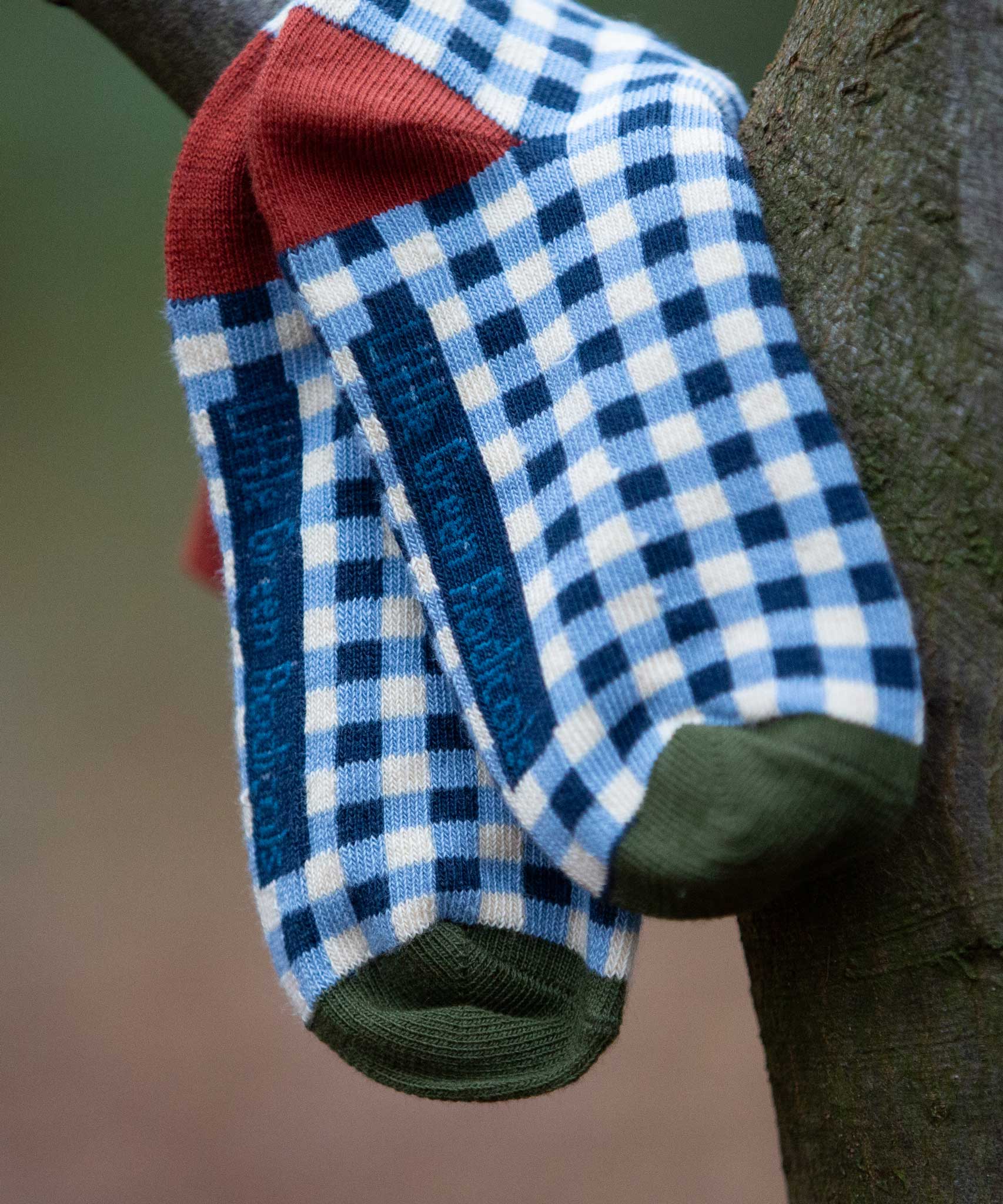 Little Green Radicals blue and white gingham style organic cotton children's socks. These socks are a part of a wide range of organic cotton clothing and accessories for children available here at Babipur. 
