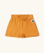 Little Green Radicals golden ochre kids shorts organic cotton shorts.