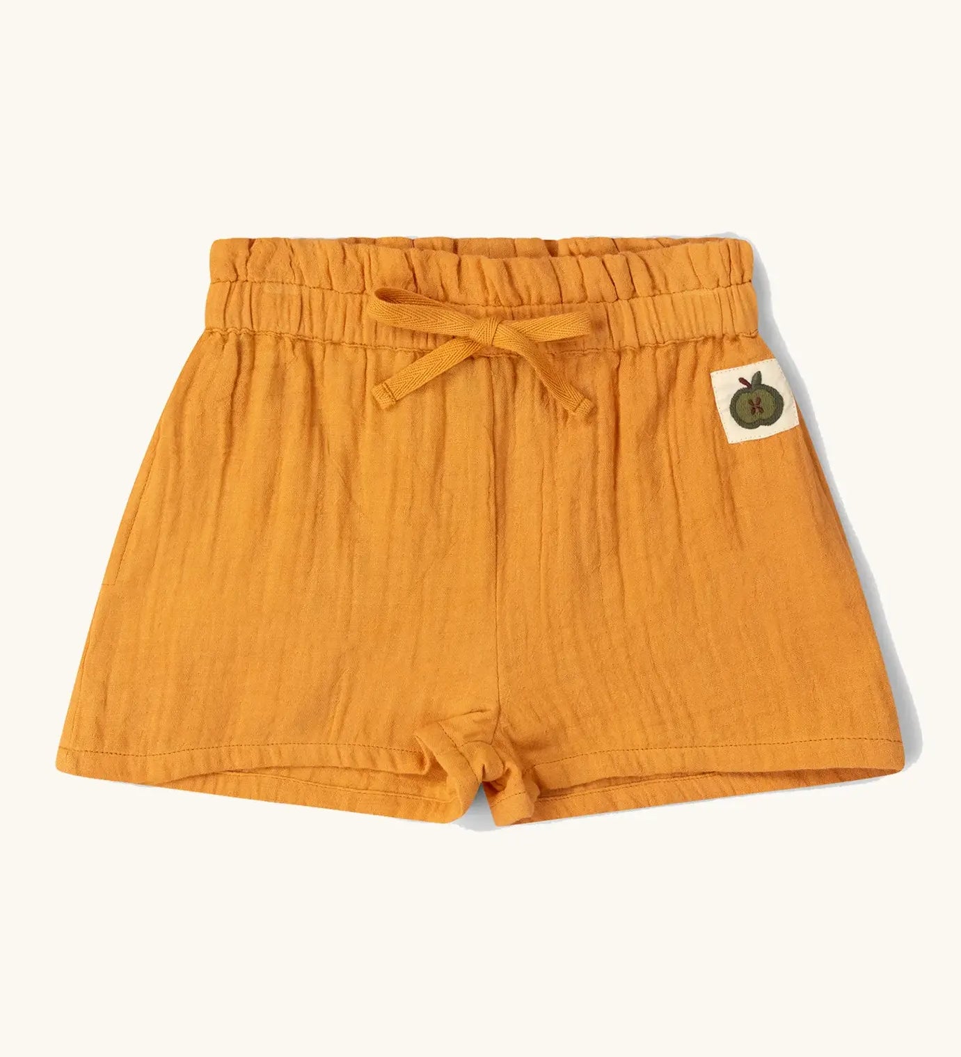 Little Green Radicals golden ochre kids shorts organic cotton shorts.