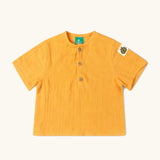 Little Green Radicals children's golden ochre yellow short sleeved, organic cotton henley top.