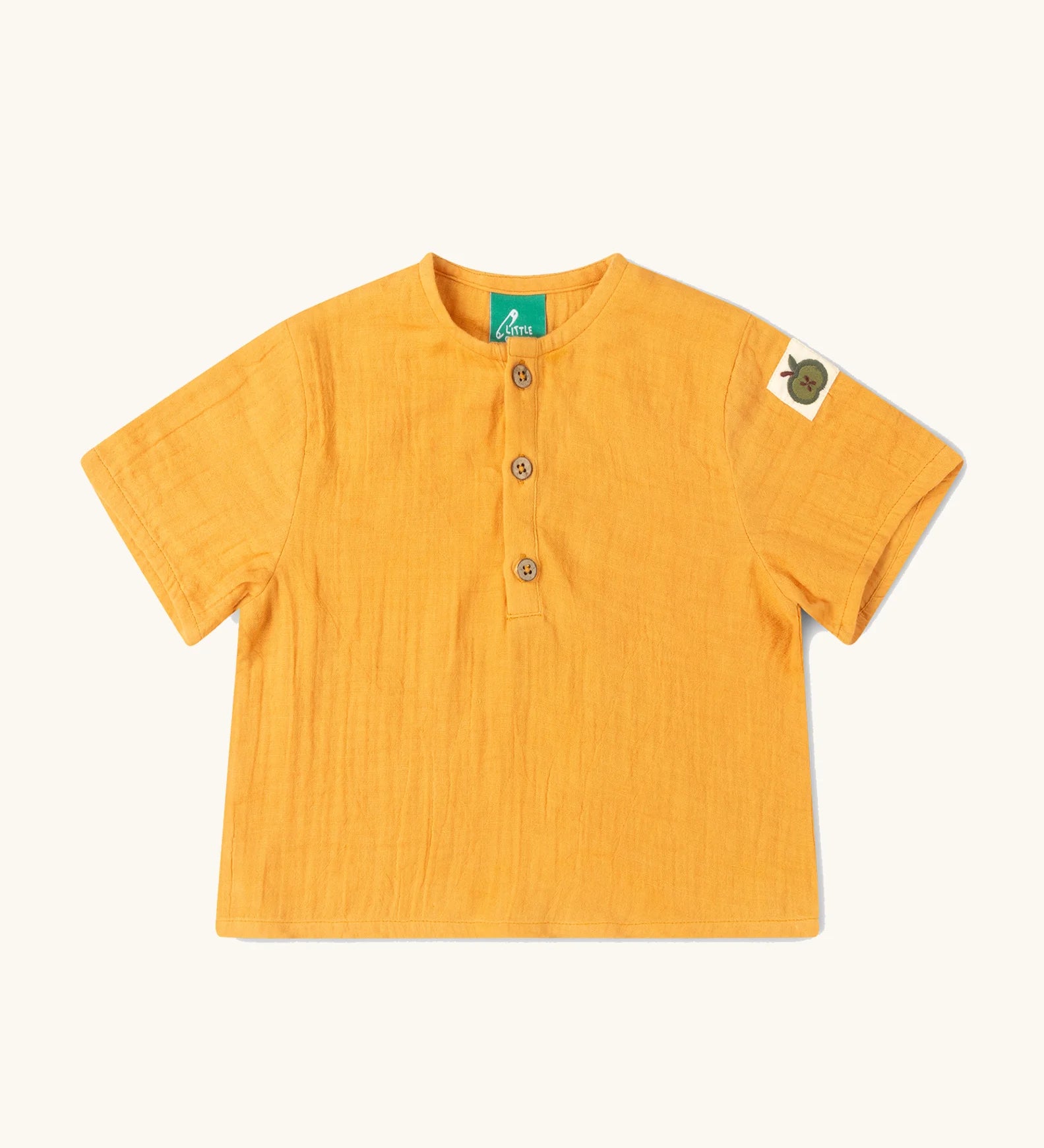Little Green Radicals children's golden ochre yellow short sleeved, organic cotton henley top.