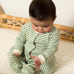 Little Green Radicals Organic 2 Pack Baby Body Set - a baby wearing the green and white striped babygrow. 