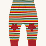 Little Green Radicals Kids' Knee Patch Joggers with Rainbow Striped. The knee patches are red stars. These organic cotton trousers are past of a wide range of children's clothing available at Babipur. 