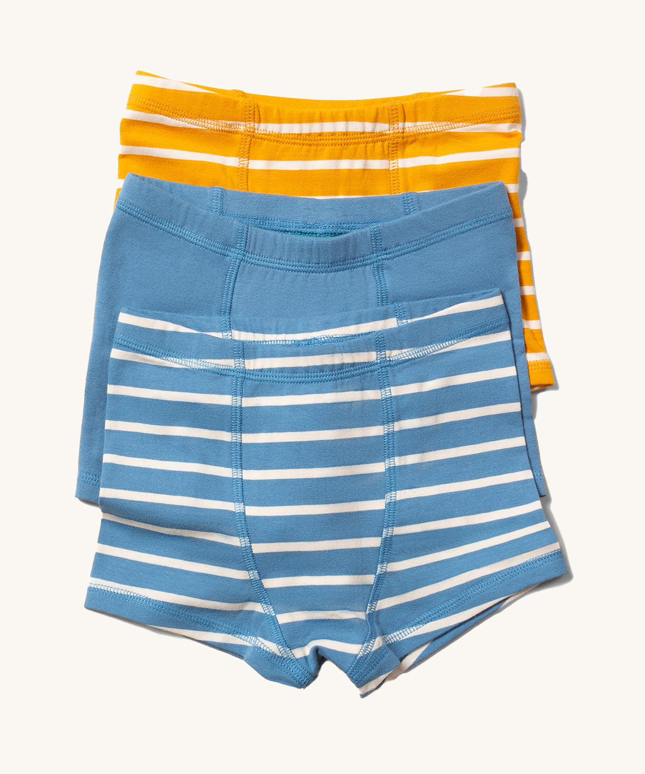 Little Green Radicals organic Cotton Boxer Shorts Underwear Set containing one blue and white striped boxer shorts, one plain blue and one yellow and white striped pair.