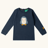 Little Green Radicals blue penguins applique long sleeve organic cotton top in navy.