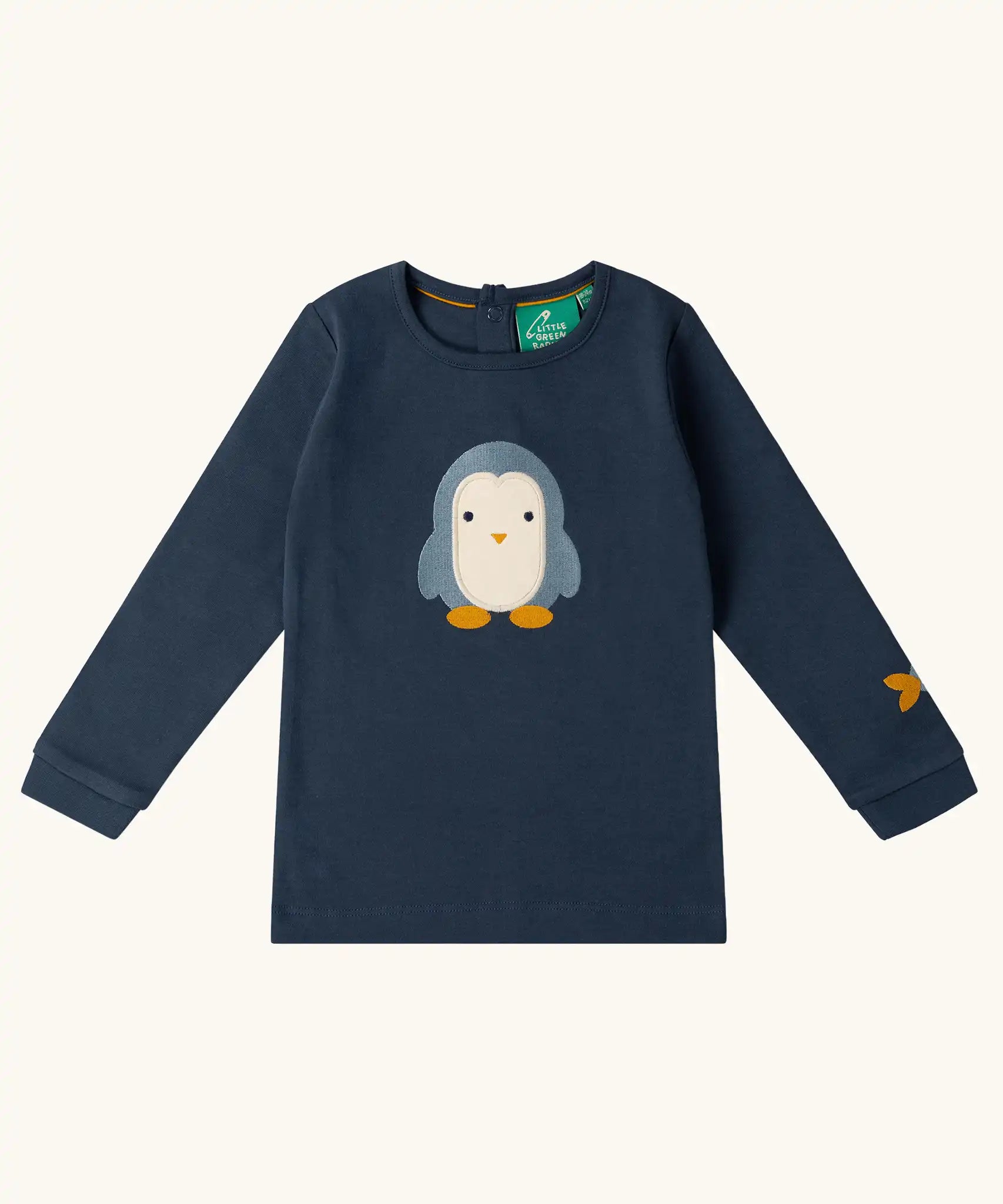 Little Green Radicals blue penguins applique long sleeve organic cotton top in navy.